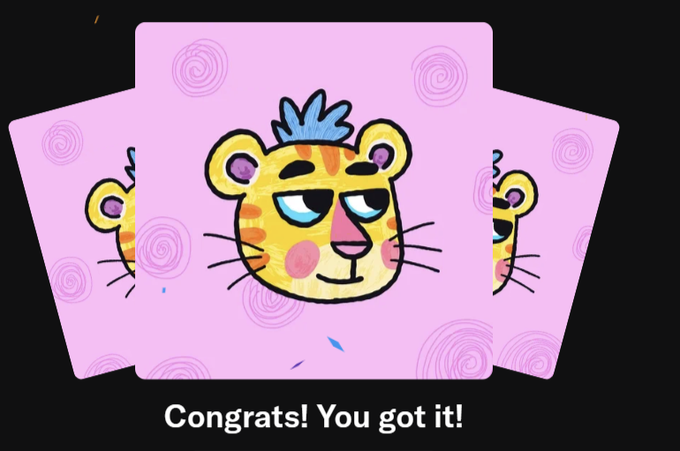 A cartoon illustration on pink cards showing a cute tiger character with blue hair, accompanied by the text 'Congrats! You got it!' at the bottom.