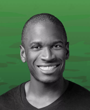 Arthur Hayes is smiling for a portrait photo, wearing a black t-shirt and standing against a green backdrop with diagonal lines across it. The caption below Arthur's photograph states that he was awarded the Bullish token worth $150. This means Arthur has been recognized with a substantial monetary value for his talent or achievement in the field of cryptocurrency, specifically for the creation of the Bullish token.