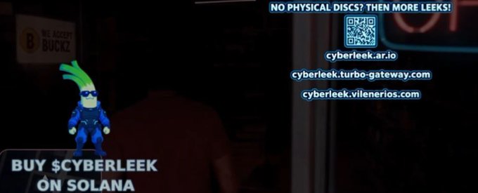 A promotional image featuring a leek-themed superhero character ('Cyberleek') with text 'BUY $CYBERLEEK ON SOLANA', a QR code, and three website URLs: cyberleek.ar.io, cyberleek.turbo-gateway.com, and cyberleek.vilenerios.com.