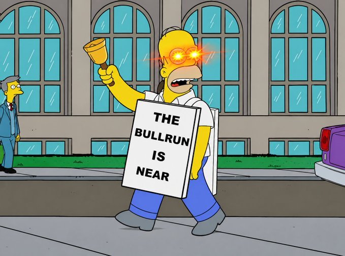 A Simpsons-style Homer Simpson character with glowing red eyes holds a bell and a sign reading "THE BULLRUN IS NEAR," satirizing overzealous crypto hype—fitting the post's bold "1000x" prediction of an imminent parabolic market surge.