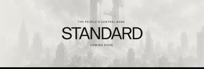 Minimalist grayscale banner for 'STANDARD' with the tagline 'THE PEOPLE'S CENTRAL BANK' and 'COMING SOON' over a faded cityscape.