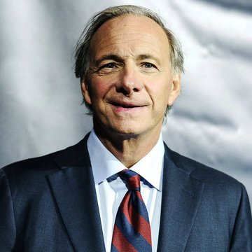 Ray Dalio, the billionaire founder of Bridgewater Associates, pictured here in a formal headshot wearing a dark suit and striped tie. The image accompanies his endorsement of Bitcoin as an emerging hard currency with worldwide acceptance.
