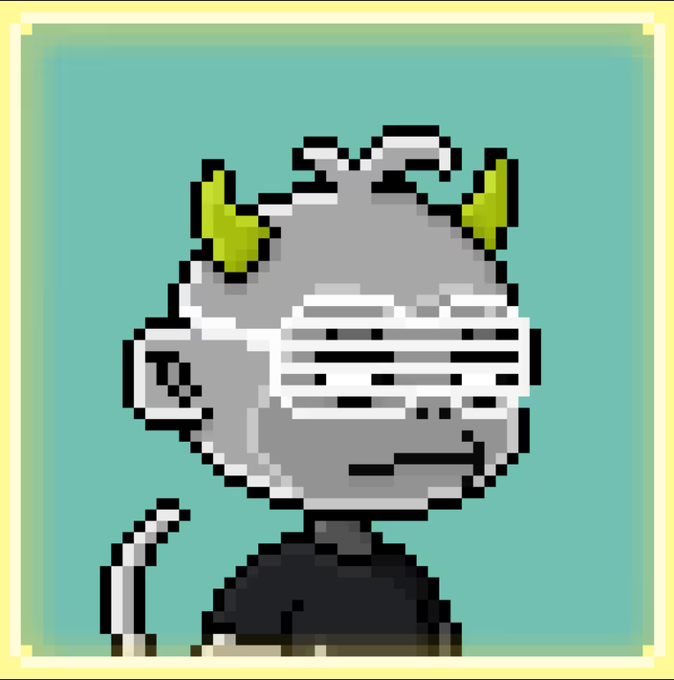 A pixel art illustration of a round, gray character wearing green leaf-like ears and sporting a wide, toothy grin, set against a light teal background.