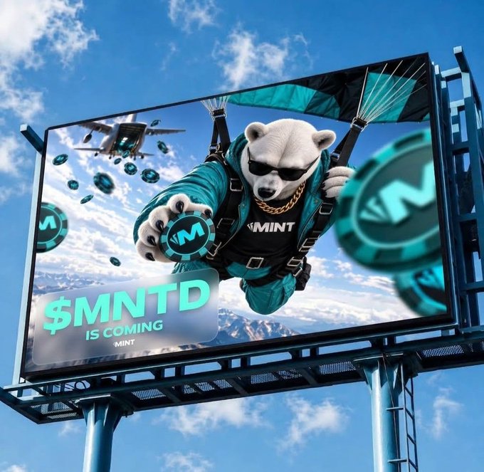 A billboard advertisement featuring a white bear in sunglasses and green jacket parachuting with '$MNTD IS COMING - MINT' text and falling coin tokens against a sky background.