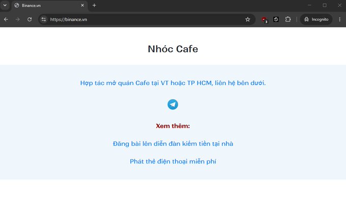 A web browser screenshot of a site titled 'Nhóc Cafe' with Vietnamese text about a cafe collaboration in Ho Chi Minh City and links including 'Đăng bài lên diễn đàn kiếm tiền tại nhà' and 'Phát thẻ điện thoại miễn phí'.