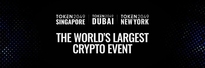 Promotional banner for TOKEN2049 Singapore, Dubai, and New York, branded as "The World's Largest Crypto Event." The image relates to the post, which highlights news from Day 1 of the TOKEN2049 Singapore conference.