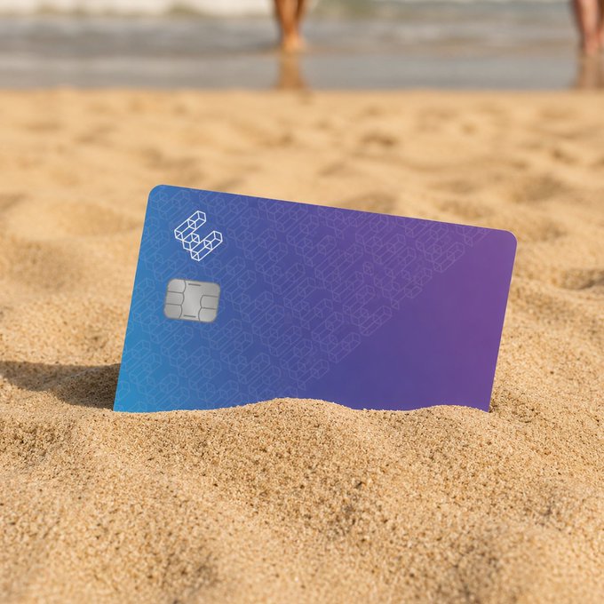 An EtherFi branded credit card is partially buried in the sand on a beach, hinting at a summer announcement or event. The post details an EtherFi Summer Analyst Call on August 13th at 10 am ET.