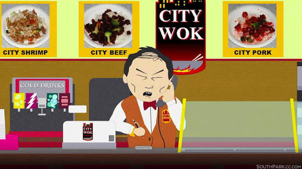 A South Park character works the counter at "City Wok," wearing a bow tie and looking displeased, with menu displays showing "CITY SHRIMP," "CITY BEEF," and "CITY PORK" above him. The caption "Yo?" suggests a casual or distracted greeting, possibly mirroring the character's unenthused demeanor as if responding to a customer.