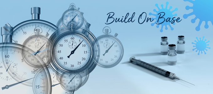 A promotional graphic with the text 'Build On Base' showing multiple stopwatches, a syringe, and small vials, with blue virus-like splatter illustrations in the background.