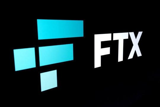 The blue and white FTX cryptocurrency exchange logo displayed against a black background.