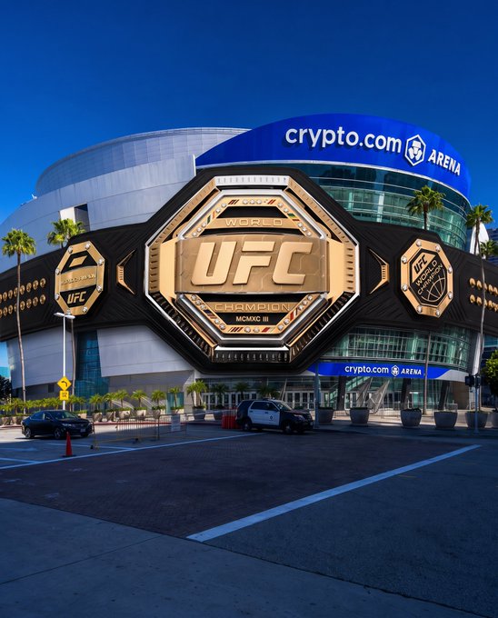 A UFC Championship belt graphic is digitally superimposed over the Crypto.com Arena, where signage for the venue is visible on the building's facade, promoting the upcoming UFC 331 event on September 19.