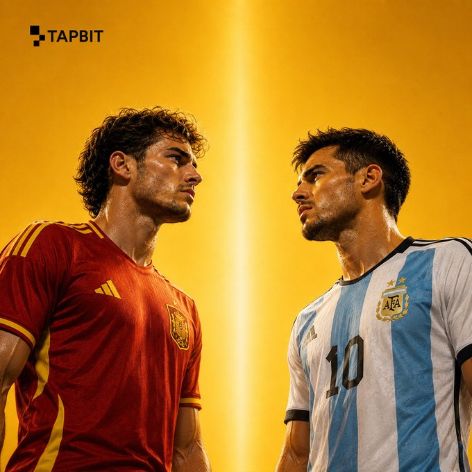 A promotional image featuring two soccer players in Spain (red) and Argentina (blue and white #10) jerseys facing each other against a yellow background, with 'TAPBIT' branding in the upper left.