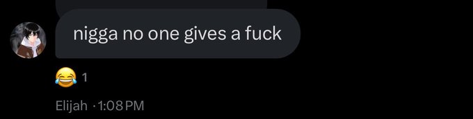 This screenshot shows a message from Elijah that reads "nigga no one gives a fuck" with a laughing emoji, humorously reacting to the news of Michael Saylor selling Bitcoin.