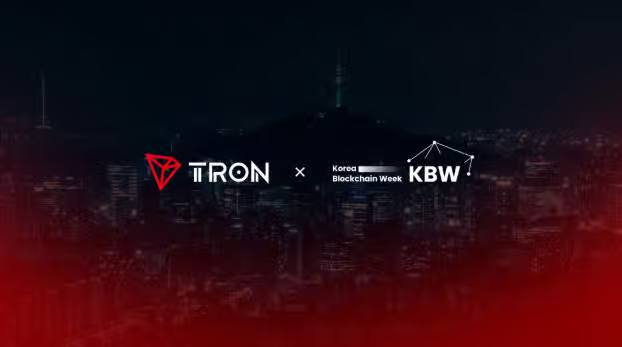 A promotional graphic with a dark cityscape background featuring the logos 'TRON' and 'Korea Blockchain Week (KBW)'.