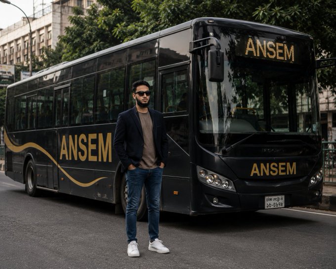 A man in sunglasses and a dark blazer stands confidently in front of a black tour bus displaying the name 'ANSEM' in gold lettering.