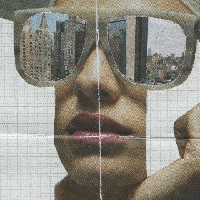 A close-up portrait of a woman wearing sunglasses that reflect a city skyline, presented in a torn-paper collage style.