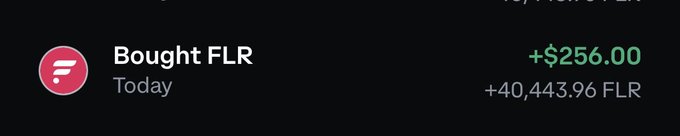 A transaction notification showing a purchase of FLR (Flare) for +$256.00, totaling +40,443.96 FLR.