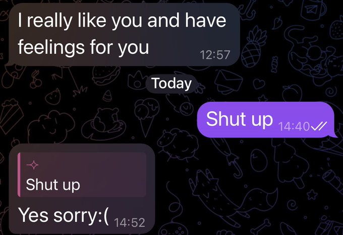 A text message conversation where one person confesses 'I really like you and have feelings for you' and receives a curt 'Shut up' reply followed by an apologetic 'Yes sorry:(('