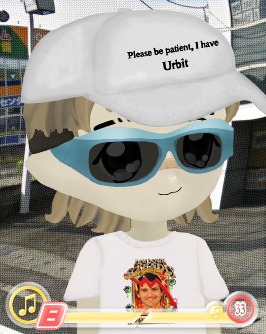 A Mii character wears a white cap reading 'Please be patient, I have Urbit', blue sunglasses, and a t-shirt featuring a graphic with the number '33' on a colorful background.