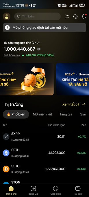 A Vietnamese cryptocurrency exchange app screenshot (Vinaphone network, 12:38) displaying total crypto asset value at 1,000,440,687 VND, with SXRP +0.17%, SETH +0.53%, and SBTC +0.43% visible.