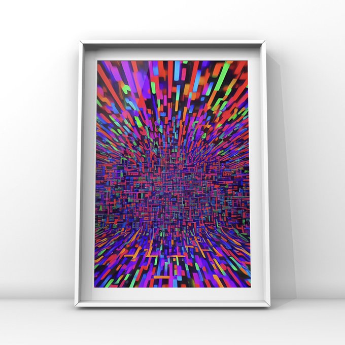 A framed piece of abstract art displayed against a white wall, featuring a vibrant, pixelated explosion of neon colors including pink, purple, blue, green, orange, and red radiating outward from the center.