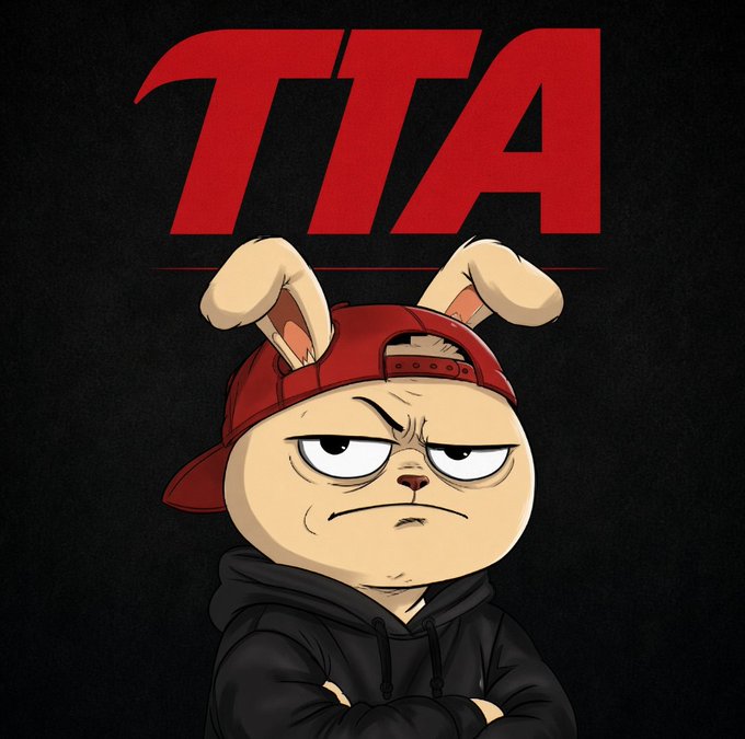 A cartoon character, an angry rabbit wearing a red backwards baseball cap and a black hoodie, posed against a black background with bold red 'TTA' lettering above.