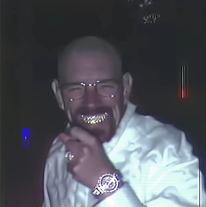 A bald man with glasses and a white shirt grins widely while holding his hand near his face, displaying a flashy watch and ring, his expression and gold teeth suggesting extravagant celebration.

The image humorously captures the ironic, over-the-top smugness of someone celebrating a modest crypto gain (turning 1 Solana into 1.3), with the man's gleeful, almost manic smile mocking the small profit as if it were a massive financial triumph.