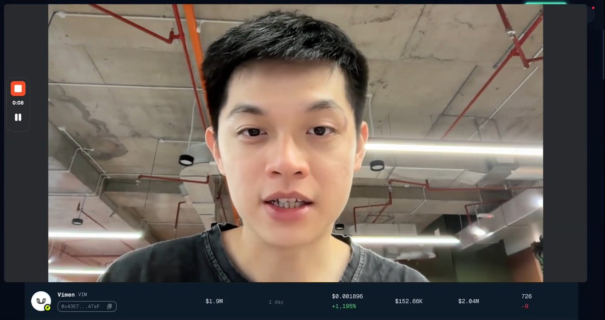 A man stands in what appears to be an industrial space with exposed pipes and fluorescent lighting, speaking directly to camera in a video by "V1men" (token address 0x43E7...47aF). The video, posted 1 day ago with $1.9M in trading volume and a 1.195% gain, features a co-founder explaining the benefits and mechanics of tokenizing on Robinhood Chain.