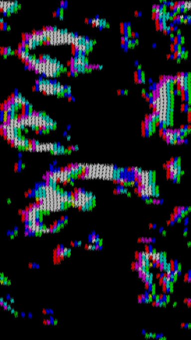 An abstract glitch art piece displays distorted, pixelated shapes in white, red, blue, and green scattered across a black background.