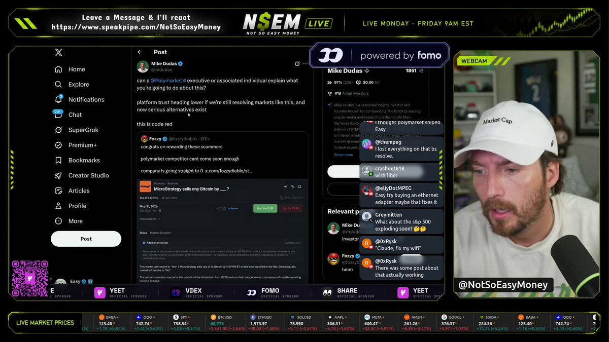 The image shows a Twitter chat screen with a man wearing a white baseball cap and a black shirt typing on his computer, actively participating in a discussion about MicroStrategy Polymarket drama. The caption reads "Easy reacts to the MicroStrategy Polymarket drama and says the market should resolve YES", which indicates that many people are joining the conversation and reacting positively to the situation at hand. This is relevant to the post because it talks about Bitcoin being sold during May, as seen in the image, which suggests that this discussion might be related to the cryptocurrency trading activity or an update on a stock trading event involving MicroStrategy Polymarket. The hashtag used in the tweet, "#MicroStrategy", also seems to be part of the ongoing conversation.