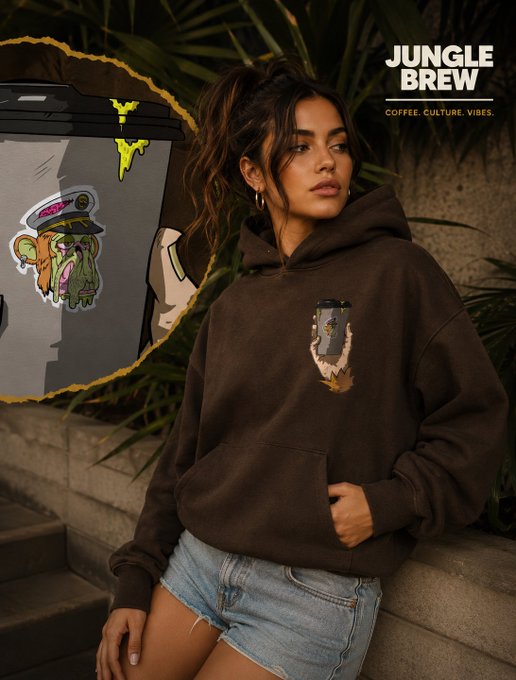 A woman models a dark brown 'JUNGLE BREW' hoodie featuring a skull graphic, paired with denim shorts, with the brand tagline 'COFFEE. CULTURE. VIBES.' displayed alongside a product illustration.