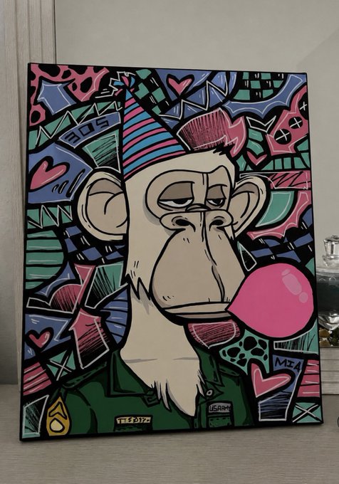 A colorful pop-art style canvas painting depicts a bored-looking monkey in a US Army uniform blowing a large pink bubblegum bubble, with '2015' and 'USARMY' visible amid vibrant hearts and patterns, signed 'MIA'.