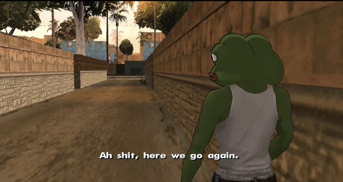 A screenshot from the video game Grand Theft Auto: San Andreas shows the green frog character with a surprised expression and tongue sticking out, accompanied by the subtitle "Ah shit, here we go again."