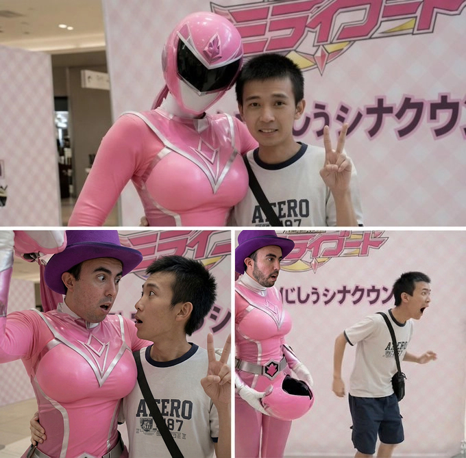 The image shows a collage of three photos from a meet-and-greet event, where a young man in an "AERO 1987" shirt poses with a pink-suited character from what appears to be a Power Rangers event, with Japanese text on the backdrop reading "...シンタクウ" (likely referring to "冒険シンタクウ" or similar). The progression of the man's expressions—from a peace sign smile to surprise, then to exaggerated shock as the costumed character removes their helmet—humorously illustrates the "$Degen explained" caption, capturing the awe and excitement of meeting a childhood hero.