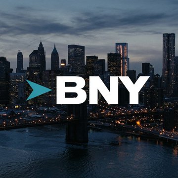 The BNY (Bank of New York Mellon) logo is overlaid on a dusk-lit cityscape featuring the Brooklyn Bridge and Manhattan skyline, visually reinforcing the company's identity as it announces plans to add crypto staking services for its institutional clients, pending regulatory approval.