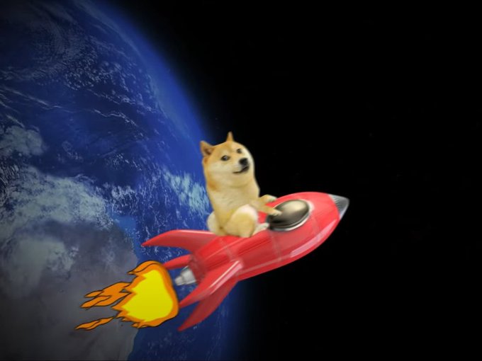 A humorous edit showing a Shiba Inu dog sitting atop a red rocket ship, appearing to fly through outer space with the Earth visible in the background.