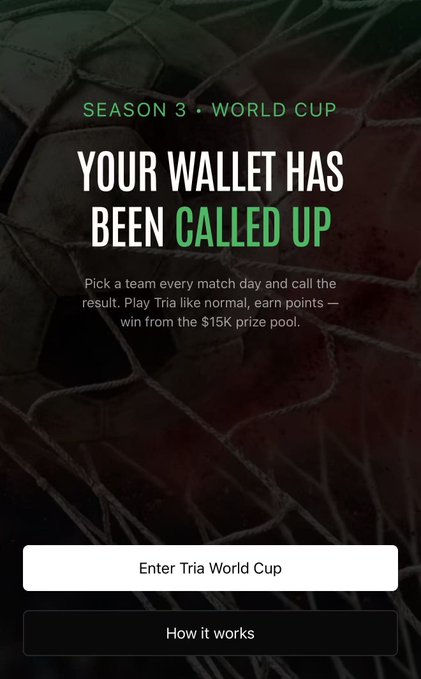 The image shows an advertisement for a soccer game that has just ended. The text on the screen reads "Your wallet has been called up" and "Enter Tria World Cup Season 3 is live, brothers—plus the platform has launched a prediction market". This suggests that there might be a competition or contest related to the soccer match, where users can predict the outcome of future matches and potentially win prizes. The image also features a close-up view of a soccer ball on the field, which adds context to the advertisement's theme.