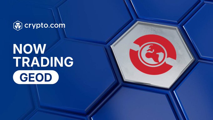 A promotional graphic from Crypto.com announces that GEODNET ($GEOD) is now available for trading, featuring the Crypto.com logo, the "NOW TRADING GEOD" text, and the GEOD globe logo displayed on a hexagonal tile against a blue honeycomb background.