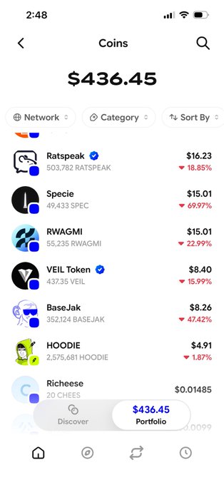 A mobile app screenshot showing a cryptocurrency portfolio valued at $436.45, listing coins including Ratspeak ($16.23, ▼18.85%), Specie ($15.01, ▼69.97%), RWAGMI ($15.01, ▼22.99%), VEIL Token ($8.40), BaseJak ($8.26), HOODIE ($4.91), and Richeese ($0.01485).