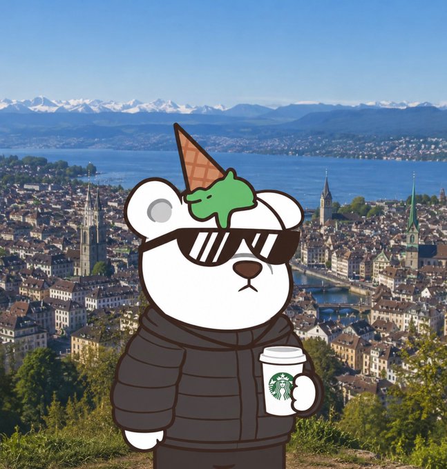 The image features a bear wearing sunglasses and a top hat, standing over the cityscape of Chamonix Mountain Village in France. The bear appears to be enjoying its time at the edge of the water, with mountains and trees visible in the background. In the foreground, there is a cup on the ground next to the bear, suggesting that it may have been having an adventure near the lake or river.