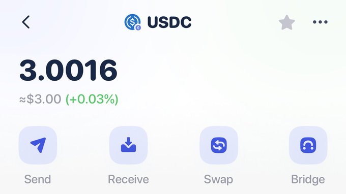 A screenshot of a crypto wallet showing a USDC balance of 3.0016 (≈$3.00), illustrating the giveaway amount the poster is offering to a random follower.