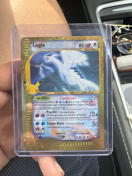A hand holds a graded Lugia Pokémon card (80 HP, Crystal Type) in a protective case, visually representing the post's claim that purchasing this card at $250 is a smart long-term investment, akin to buying Bitcoin early.