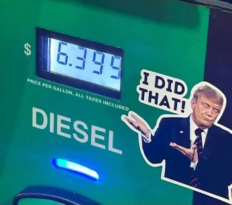 Photo of a diesel fuel pump displaying a price of $6.399 per gallon with a sticker of Donald Trump saying 'I DID THAT!'