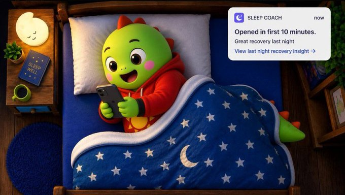 A 3D-rendered green dinosaur character in a red hoodie lies in bed under a starry blue blanket, looking at a phone, with a 'SLEEP COACH' notification popup in the corner.