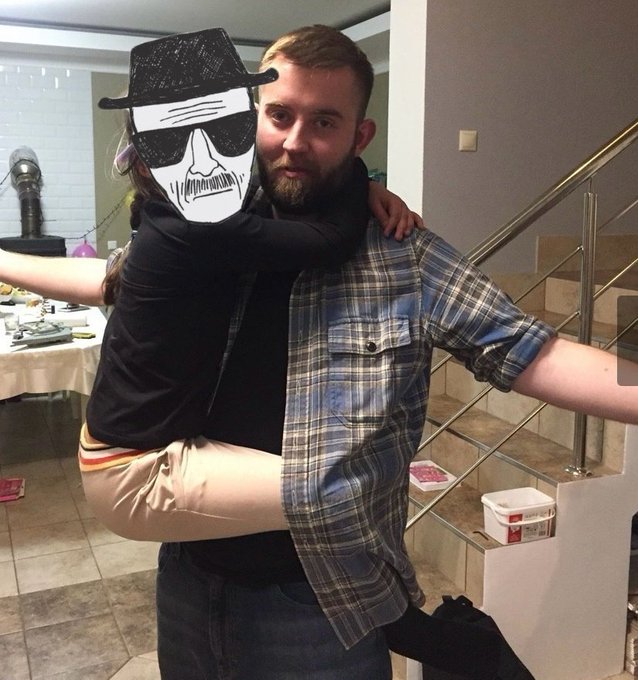 A man with a beard and a person wearing a fedora and sunglasses, with a digitally added skull face filter, embrace in a home setting near a staircase. The post celebrates the LINK token pumping while humorously noting XRP isn't moving, reflecting a celebratory, lighthearted mood.