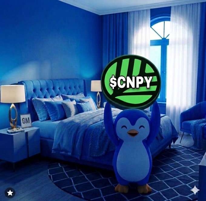 The image features a penguin standing on a blue bedspread with a lamp next to it. The penguin has its arms raised high above its head. In the background of the image, there are two lamps that provide light for the room. A caption is also present in the image, which reads "One thing that stood out to me as I read the latest @CNPYNetwork acquisition of Tanssi's core IP update is how it tackles a major challenge behind launching independent chains".