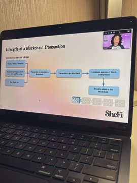 A laptop screen displays a presentation slide titled "Lifecycle of a Blockchain Transaction" by Shefi, showing the steps from initiating a transaction in MetaMask to blockchain validation and block inclusion. The image supports the post's lesson on wallets and security, highlighting the blockchain transaction process that underlies self-custody and asset ownership in web3.
