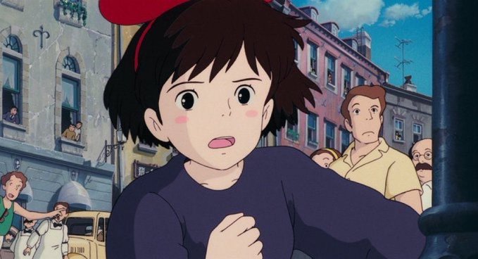 The image features an animated character from the movie "Grimmsey Pimpy". The character appears to be looking at something or someone outside of the frame, possibly a person wearing a red hat. In the background, there are several people standing around in front of buildings and cars, which adds context to the scene. A post on social media is visible, discussing Bitcoin's value reaching 100 million yen by 2053. The character seems to be reacting to this news or engaging with it in some way.