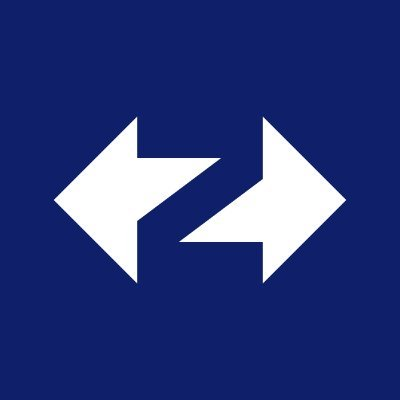 The image features a blue background with two white arrows pointing in opposite directions, creating an arrow-like shape. The text "z" is written below the arrows, which could be interpreted as a symbol or representation of the concept of zeros. The caption provided after the image explains that it is related to the post about financial history and mentions the importance of focusing on what's in the image rather than getting distracted by unrelated details.