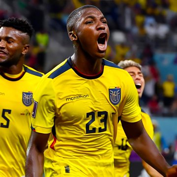 A player wearing Ecuador's yellow jersey with the number 23 screams in celebration, likely reacting to scoring against Germany in the World Cup—a result that would pay out big on the $465k bet against Germany winning.